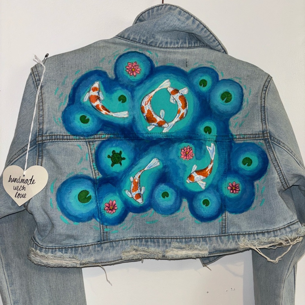 Hand painted cropped denim jacket with original design.